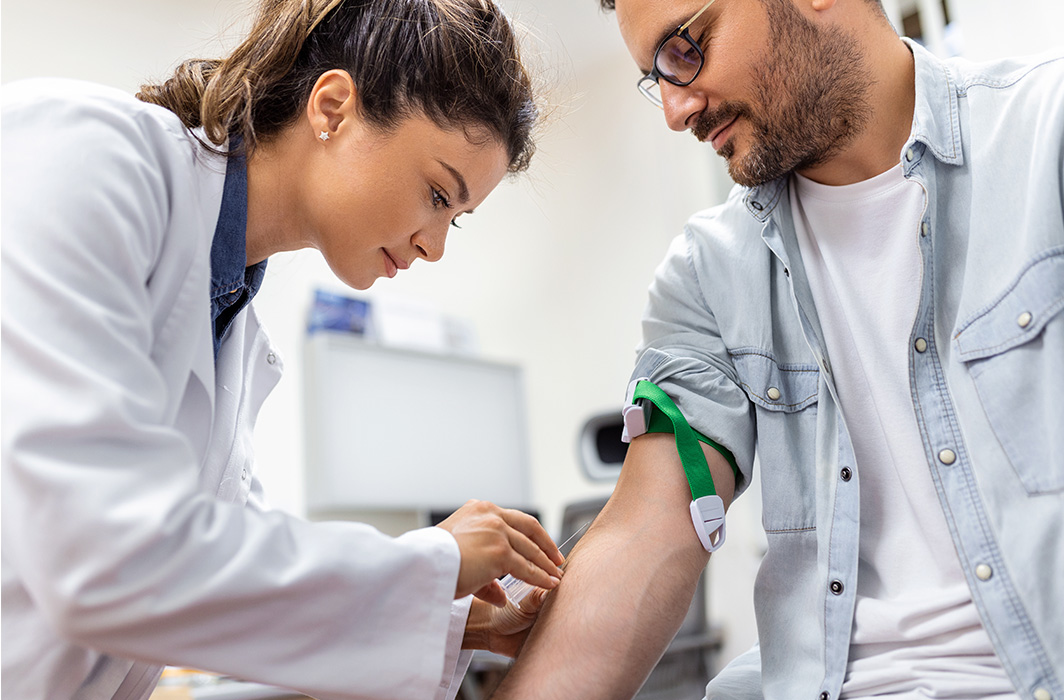 Dr. Bhanwath consulting with patient